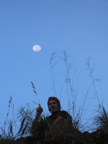 Resized finger pointing at moon